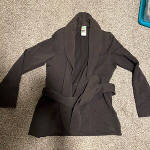 Gray women’s The North Face cardigan.